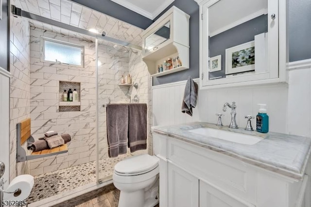 500 Charlestown Rd, Bethlehem Twp, NJ 08827 - bathroom featuring vanity, crown molding, a stall shower, wood finished floors, and a wainscoted wall