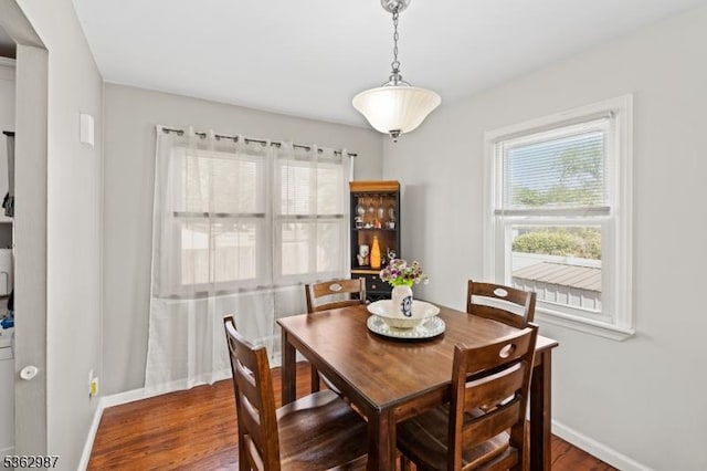 315 D St, Middlesex Boro, NJ 08846 - dining area featuring dark wood-type flooring and baseboards