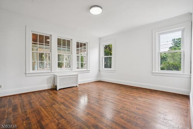 303 Tuttle Pkwy, Westfield Town, NJ 07090 - empty room with radiator and wood finished floors