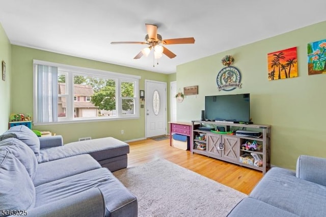 95 1st Ave, Woodbridge Twp, NJ 07064 - living area featuring ceiling fan, wood finished floors, and baseboards