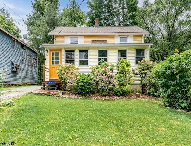 177 Schooleys Mountain Rd, Washington Twp, NJ 07853 - view of front of property featuring a front yard and a chimney