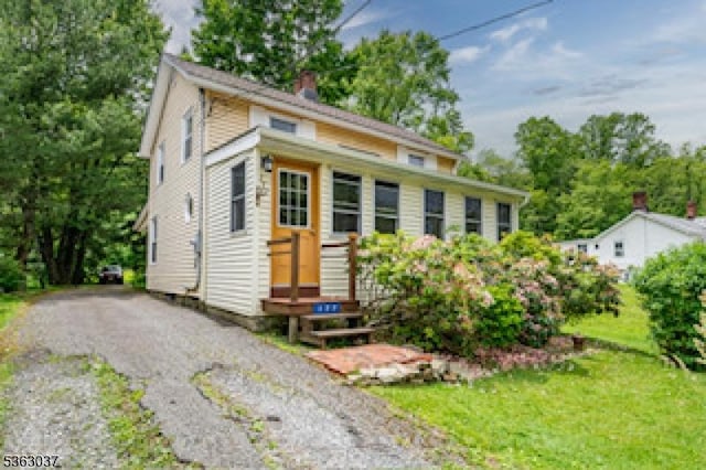 177 Schooleys Mountain Rd, Washington Twp, NJ 07853 - view of front of house featuring a chimney