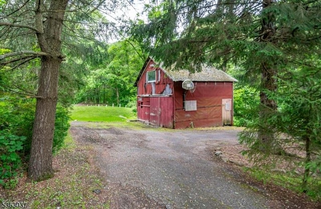 177 Schooleys Mountain Rd, Washington Twp, NJ 07853 - view of shed with a view of trees