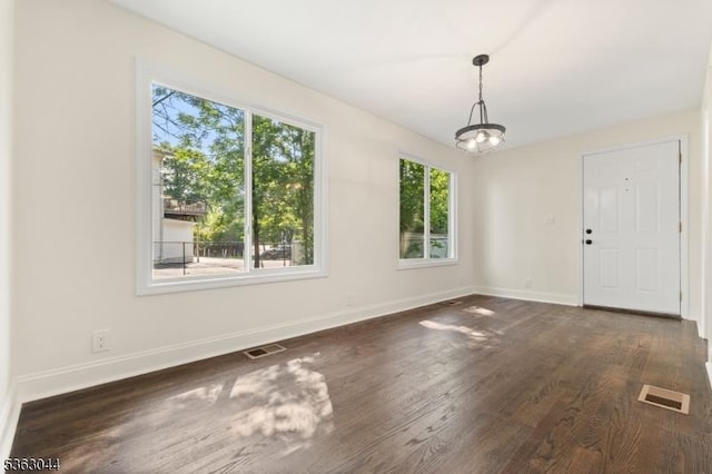 856 Maurice Ave, Rahway City, NJ 07065 - unfurnished dining area featuring baseboards and wood finished floors