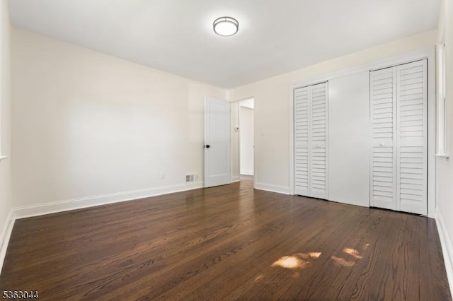 856 Maurice Ave, Rahway City, NJ 07065 - unfurnished bedroom featuring wood finished floors, baseboards, and a closet