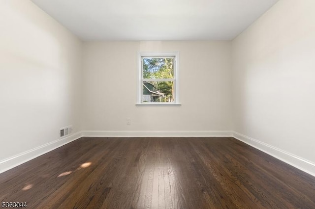 856 Maurice Ave, Rahway City, NJ 07065 - spare room featuring dark wood-style floors and baseboards