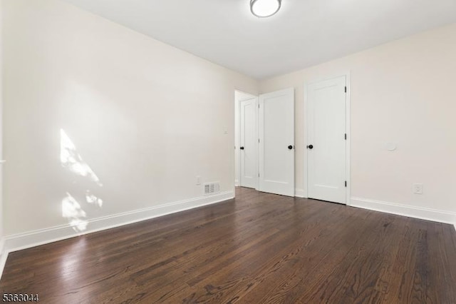 856 Maurice Ave, Rahway City, NJ 07065 - unfurnished room featuring baseboards and dark wood-style flooring