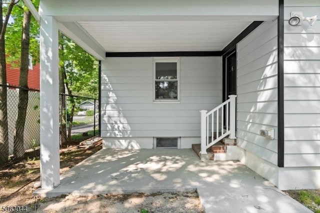 856 Maurice Ave, Rahway City, NJ 07065 - doorway to property with a patio area and a carport
