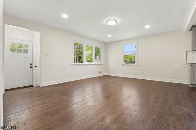 856 Maurice Ave, Rahway City, NJ 07065 - unfurnished living room with healthy amount of natural light, dark wood finished floors, baseboards, and recessed lighting