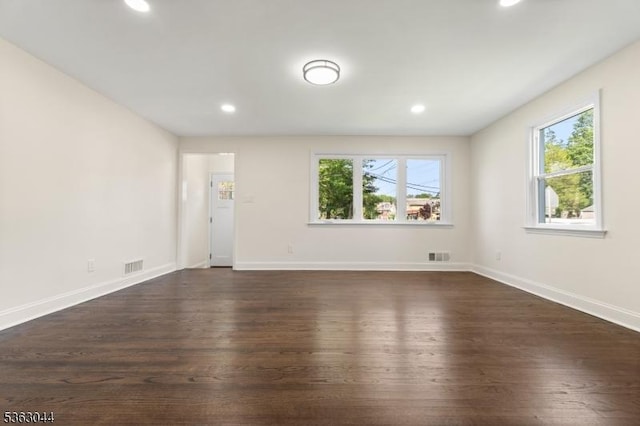 856 Maurice Ave, Rahway City, NJ 07065 - unfurnished room featuring plenty of natural light, recessed lighting, dark wood-style floors, and baseboards