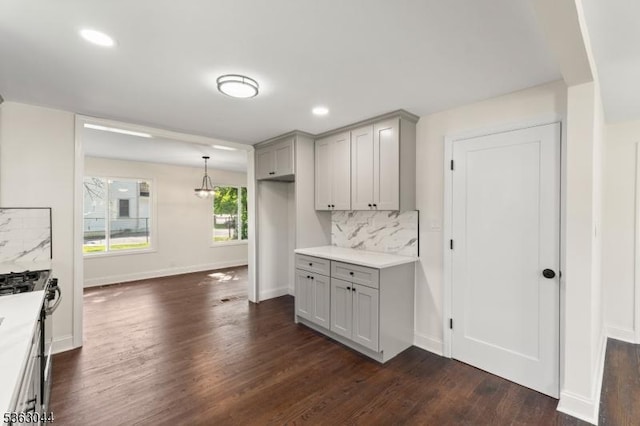 856 Maurice Ave, Rahway City, NJ 07065 - kitchen featuring gray cabinetry, backsplash, dark wood-style flooring, light countertops, and stainless steel range with gas stovetop