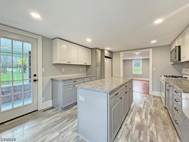 150 Mt Salem Rd, Wantage Twp, NJ 07461 - kitchen with gas range gas stove, stainless steel microwave, gray cabinetry, a center island, and recessed lighting