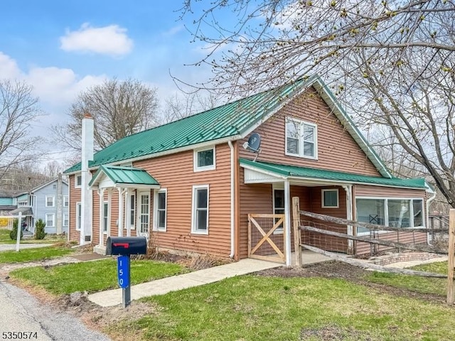 150 Mt Salem Rd, Wantage Twp, NJ 07461 - view of front facade with metal roof, a chimney, and a front lawn
