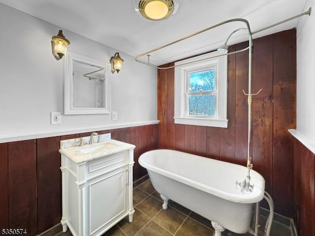 150 Mt Salem Rd, Wantage Twp, NJ 07461 - full bath featuring a freestanding tub, vanity, a wainscoted wall, wood walls, and tile patterned floors