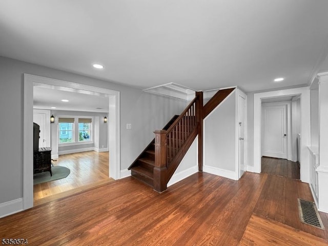 150 Mt Salem Rd, Wantage Twp, NJ 07461 - entryway featuring wood finished floors, a wood stove, stairway, recessed lighting, and baseboards