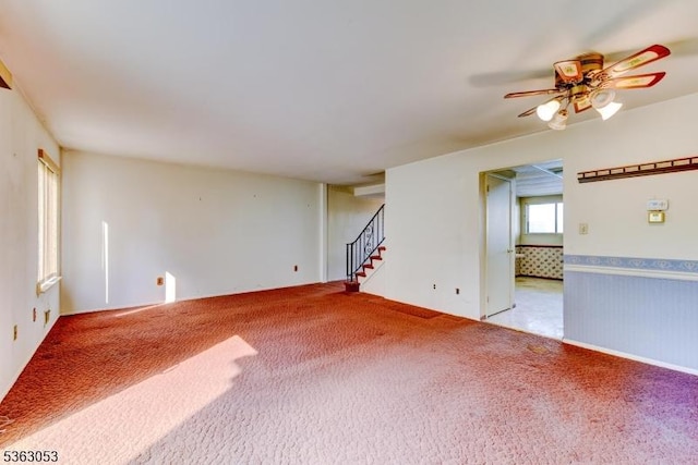 902E Merritt Dr, Hillsborough Twp, NJ 08844 - unfurnished room with stairway, carpet flooring, and a ceiling fan