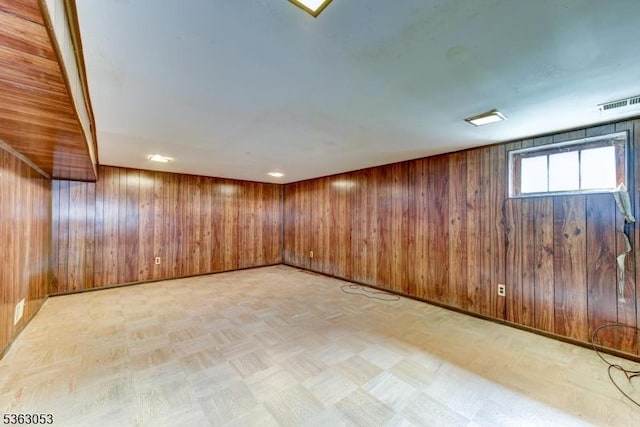 902E Merritt Dr, Hillsborough Twp, NJ 08844 - spare room with wooden walls, light flooring, and baseboards