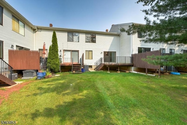 902E Merritt Dr, Hillsborough Twp, NJ 08844 - rear view of house featuring stairs, a deck, a chimney, and central air condition unit