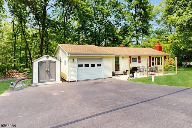 48 Copeley Rd, Hampton Twp, NJ 07860 - ranch-style home featuring a chimney, a garage, driveway, and a front yard