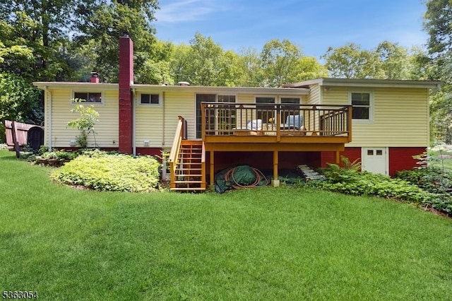 48 Copeley Rd, Hampton Twp, NJ 07860 - rear view of house featuring a wooden deck, a yard, a garage, stairway, and a chimney