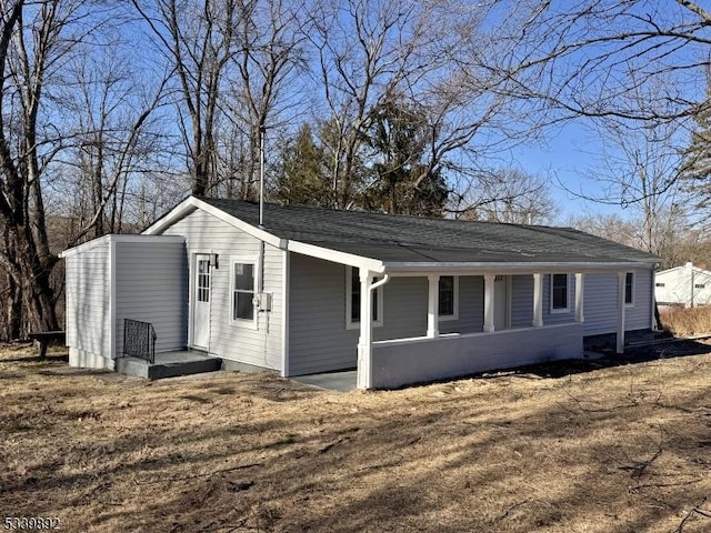 54 Coykendall Rd, Wantage Twp, NJ 07461 - view of home's exterior featuring covered porch and a shingled roof