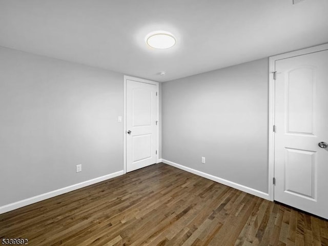 54 Coykendall Rd, Wantage Twp, NJ 07461 - empty room with dark wood finished floors and baseboards