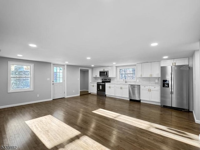 54 Coykendall Rd, Wantage Twp, NJ 07461 - kitchen with appliances with stainless steel finishes, recessed lighting, dark wood-style flooring, plenty of natural light, and baseboards