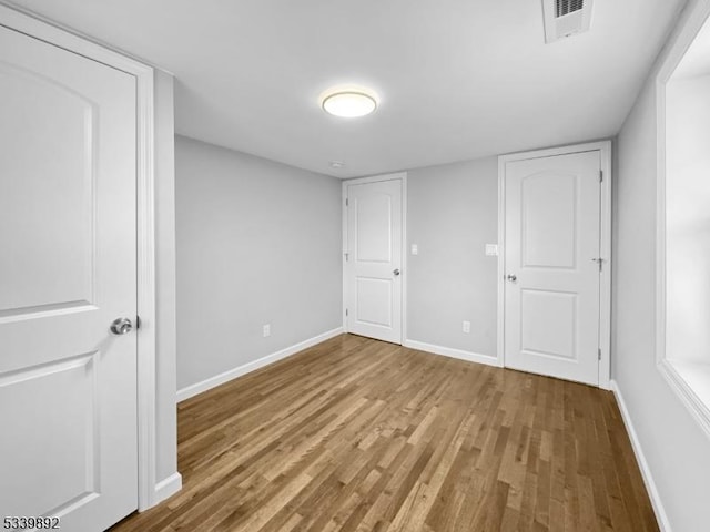 54 Coykendall Rd, Wantage Twp, NJ 07461 - unfurnished bedroom with wood finished floors and baseboards