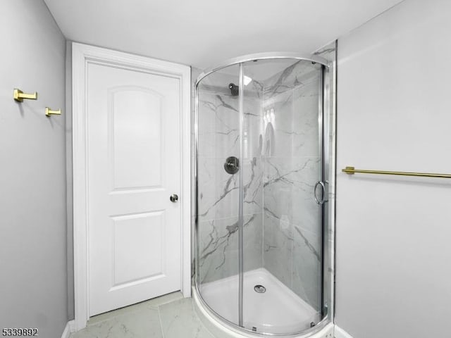 54 Coykendall Rd, Wantage Twp, NJ 07461 - bathroom with marble look tile flooring, a marble finish shower, and baseboards