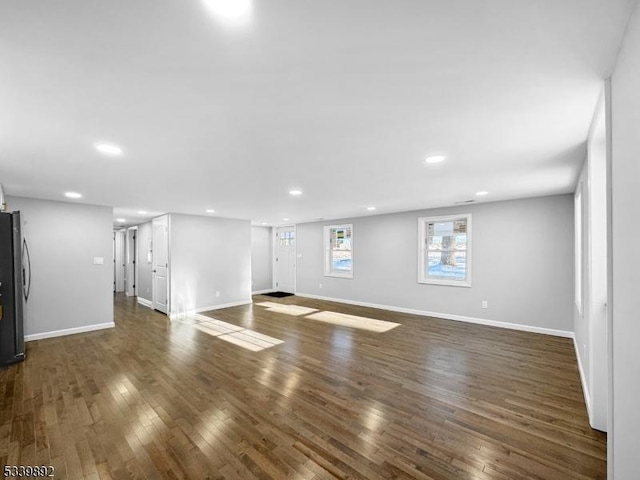 54 Coykendall Rd, Wantage Twp, NJ 07461 - unfurnished living room with dark wood-style flooring, recessed lighting, and baseboards