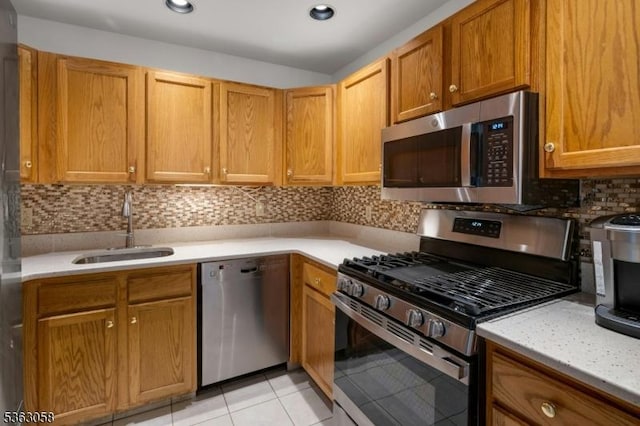 31 Park Edge, Berkeley Heights Twp, NJ 07922 - kitchen featuring stainless steel appliances, tasteful backsplash, light tile patterned flooring, recessed lighting, and brown cabinets