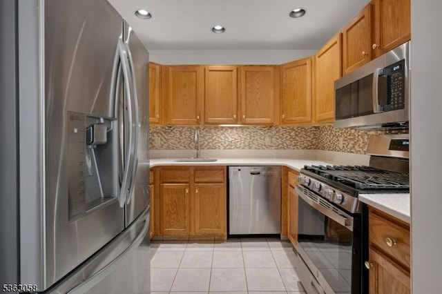 31 Park Edge, Berkeley Heights Twp, NJ 07922 - kitchen with appliances with stainless steel finishes, light countertops, light tile patterned flooring, recessed lighting, and backsplash