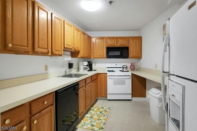 31 Park Edge, Berkeley Heights Twp, NJ 07922 - kitchen featuring black appliances, light countertops, brown cabinets, and light tile patterned floors
