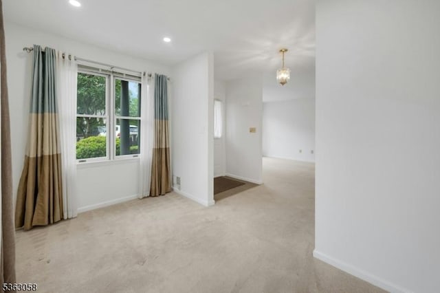 31 Park Edge, Berkeley Heights Twp, NJ 07922 - unfurnished room with light carpet, a chandelier, and recessed lighting