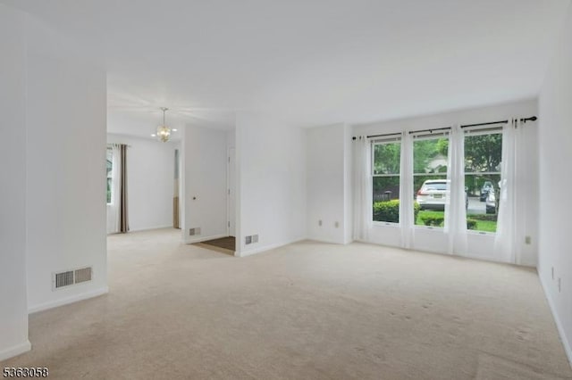 31 Park Edge, Berkeley Heights Twp, NJ 07922 - carpeted empty room with a chandelier and baseboards