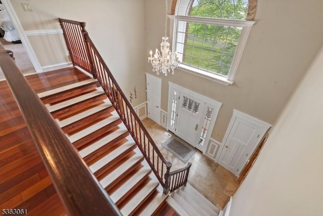 6 Fellen Pl, Hillsborough Twp, NJ 08844 - staircase with a towering ceiling and a chandelier