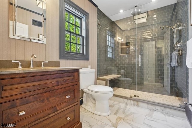 34 Oak Bend Rd, West Orange Twp, NJ 07052 - bathroom featuring marble look tile flooring, vanity, a stall shower, and recessed lighting