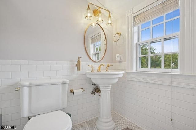 34 Oak Bend Rd, West Orange Twp, NJ 07052 - bathroom featuring tile walls, tile patterned floors, and a wainscoted wall