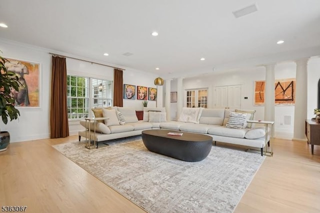 34 Oak Bend Rd, West Orange Twp, NJ 07052 - living area featuring light wood finished floors, ornate columns, recessed lighting, and ornamental molding