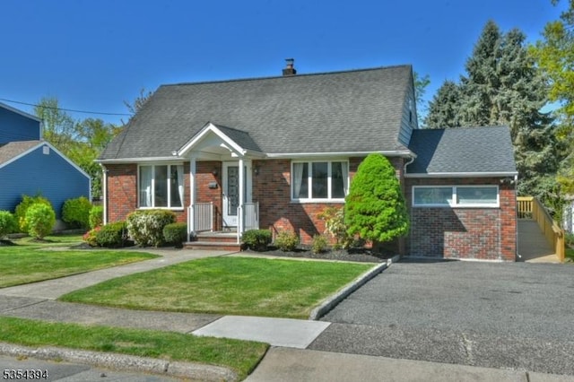 11-06 Marshall Rd, Fair Lawn Boro, NJ 07410 - cape cod home with brick siding, a front lawn, a shingled roof, and a chimney