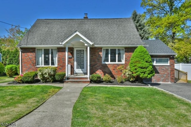 11-06 Marshall Rd, Fair Lawn Boro, NJ 07410 - view of front of home with brick siding and a shingled roof