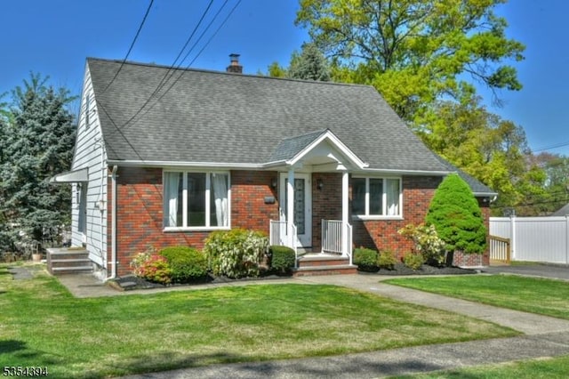 11-06 Marshall Rd, Fair Lawn Boro, NJ 07410 - cape cod-style house with brick siding, a chimney, and roof with shingles