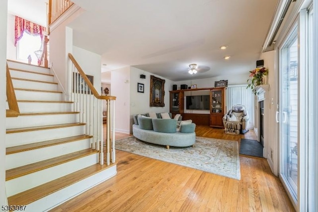 42 Stephens Mill Rd, Mount Olive Twp, NJ 07840 - living room featuring stairway and light wood-type flooring