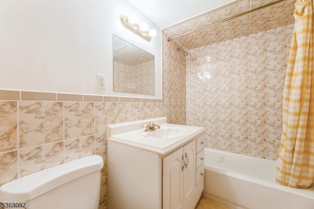 42 Stephens Mill Rd, Mount Olive Twp, NJ 07840 - bathroom featuring tile walls, shower / bath combo with shower curtain, vanity, and toilet