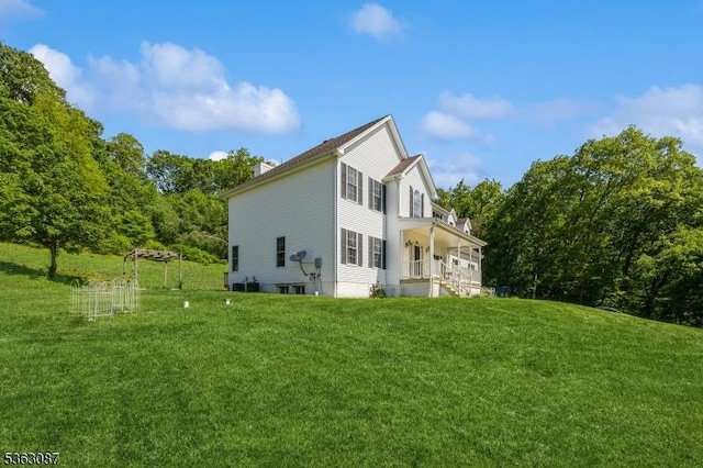 42 Stephens Mill Rd, Mount Olive Twp, NJ 07840 - view of property exterior with a yard, covered porch, and a chimney
