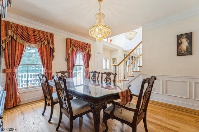 42 Stephens Mill Rd, Mount Olive Twp, NJ 07840 - dining area featuring a chandelier, ornamental molding, light wood finished floors, and stairs