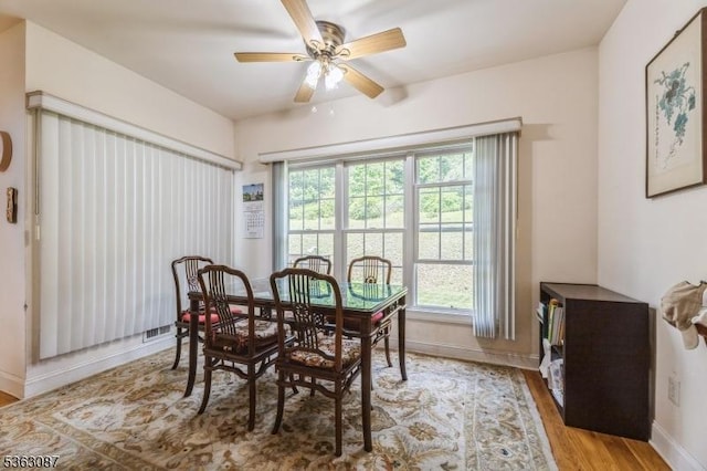 42 Stephens Mill Rd, Mount Olive Twp, NJ 07840 - dining room featuring a ceiling fan, plenty of natural light, light wood-style floors, and baseboards