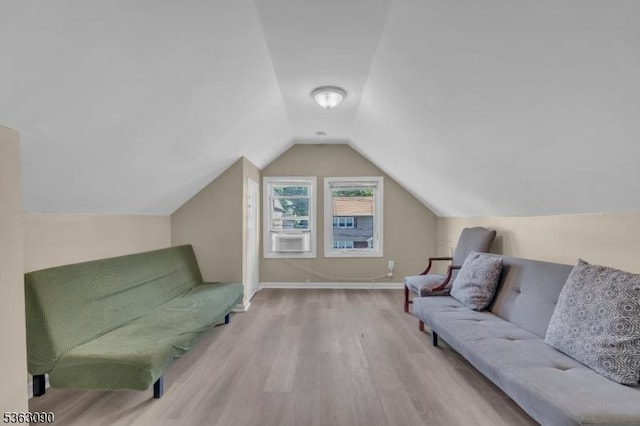 451 Centre St, Nutley Twp, NJ 07110 - living area with wood finished floors, vaulted ceiling, and baseboards