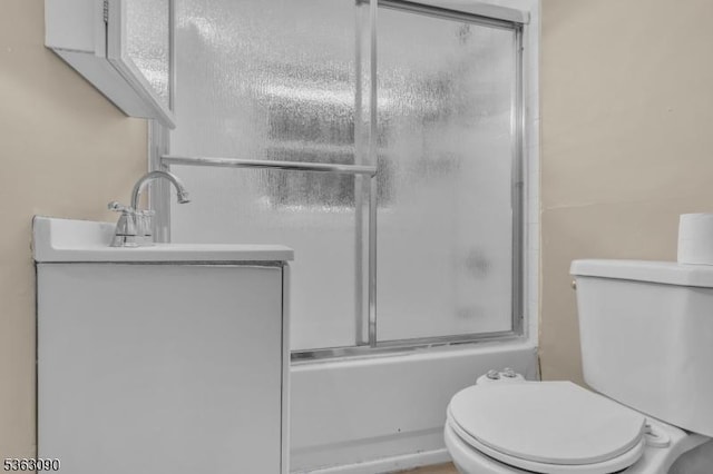 451 Centre St, Nutley Twp, NJ 07110 - bathroom with toilet, shower / bath combination with glass door, and vanity