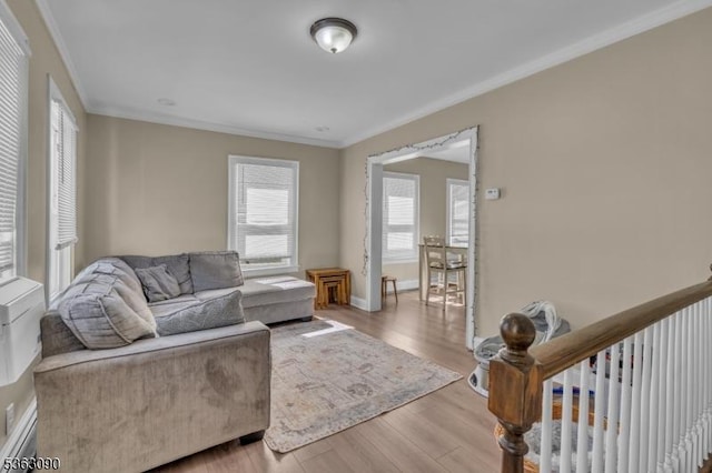 451 Centre St, Nutley Twp, NJ 07110 - living room featuring crown molding, healthy amount of natural light, wood finished floors, and baseboards